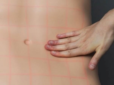 Synthetic biomimetic silicone skin on training torso model for medical simulation